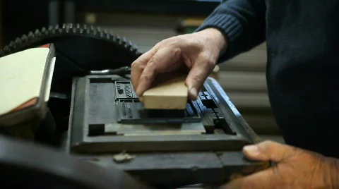 Brushing letterpress type Stock Footage 590828