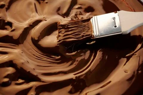 Brushing melted chocolate Stock Photos
