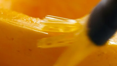 Brushing Oil on Half a Spaghetti Squash Stock Footage 125113973