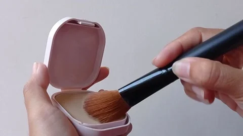 Brushing powder for a fine make up Stock Footage 145562906