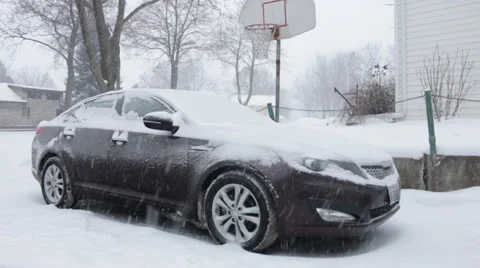 Brushing Snow Off a Car Stock Footage 34243716