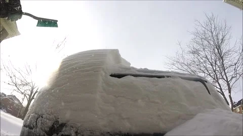 Brushing snow off vehicle Stock Footage 46695521