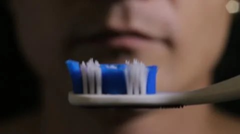 Brushing teeth close up Stock Footage 12082835