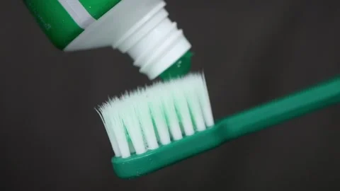 Brushing teeth with green toothpaste Stock-Footage 343805819