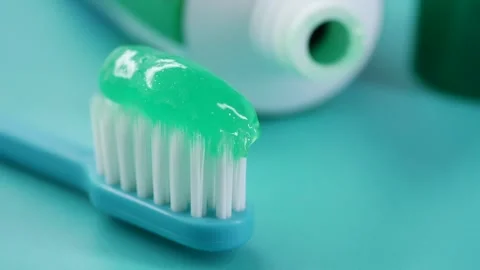 Brushing teeth with mint toothpaste at home Stock-Footage 344233391