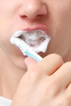 Brushing teeth Stock Photos