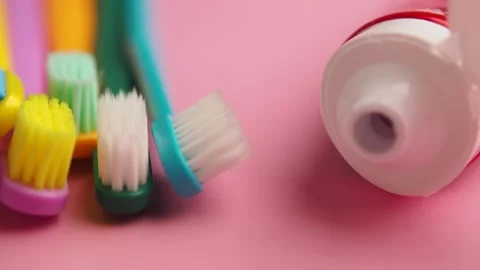 Brushing teeth with toothpaste and toothbrush at home 스톡 동영상 328391067