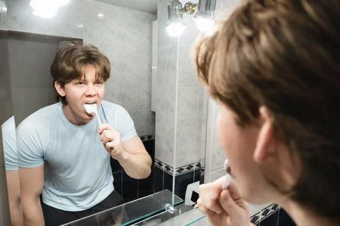 Brushing teeth with toothpaste foam. Brushing Teeth Stock Photos