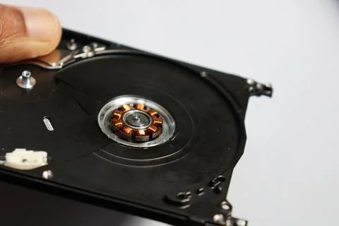 Brushless motor copper coils view from a disassembled hard disk drive Stock Photos