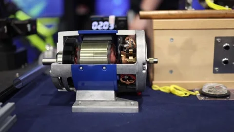 Brushless motor setup with exposed coils and bright wiring connects futuristic h Stock Footage 311046616