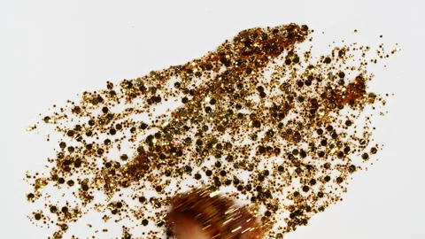 Brushstrokes of gold paint brush applied isolated on a white background. Gold 스톡 동영상 201344373