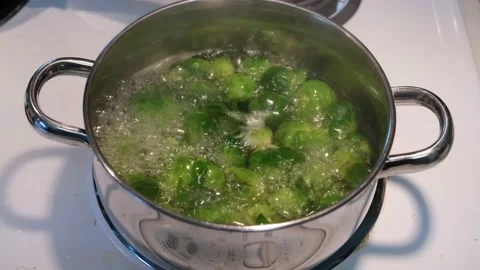 Brussel sprouts in boiling water Stock Footage 219518505