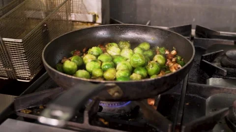 Brussel Sprouts in Frying Pan Stock Footage