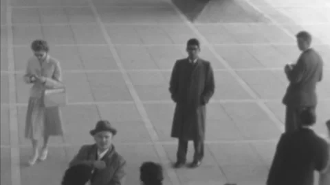 Brussels - 1958: Visitors look at sphere sculpture at 1958 Brussels Worlds Fair Stock Footage 249191863