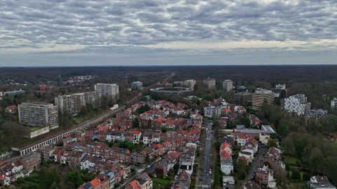 Brussels from above: Clouds cast shadows over a city rich in heritage  Stock Footage 250417624