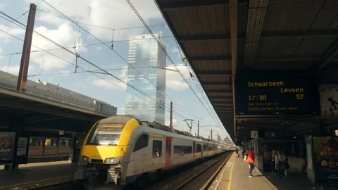 Brussels, Belgium. Train platform and train leaving from train station. Stock Footage 217931176