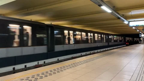 Brussels metro train arrives at underground subway station. Empty platform Stock Footage 168579337