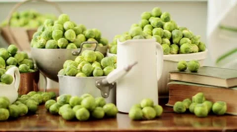 Brussels sprouts in assorted pots and dishes Video stock 24673435