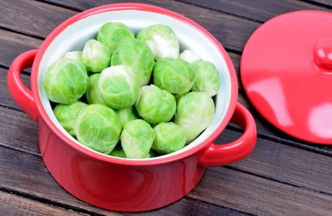 Brussels sprouts in a ceramic pot Stock Photos