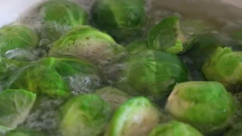 Brussels sprouts cooked in a saucepan Stock Footage 285419357