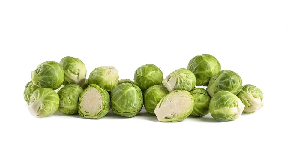 Brussels sprouts, isolate. Fresh, small Brussels sprouts stacked in a stack on a Foto stock