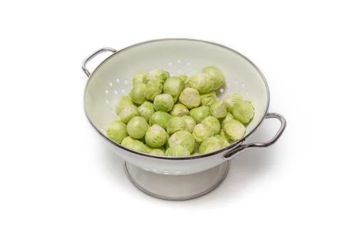 Brussels sprouts in a sieve Stock Photos