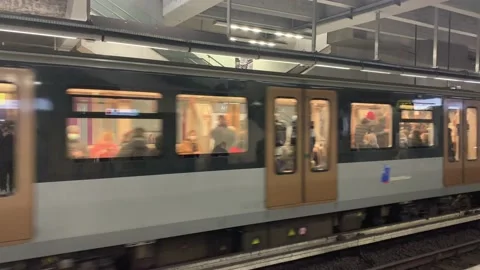 Brussels STIB-MIVB metro train arrives at Arts-Loi subway station. Brussels Stock Footage 168579318