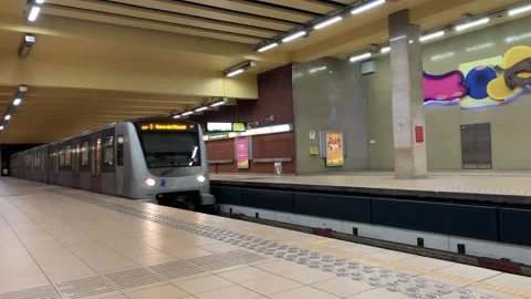 Brussels STIB-MIVB metro train arrives at underground subway station. Brussels Stock Footage 168579333