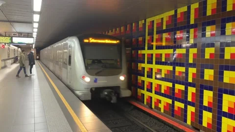 Brussels STIB-MIVB metro train arrives at Merode subway station. Brussels Stock Footage 168579361