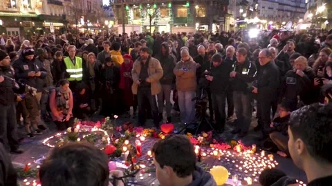 Brussels Terrorist Attacks - Flowers and candles tribute to the victims at Video stock 210169391