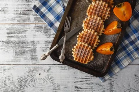 Brussels waffles on the old tray Stock Photos