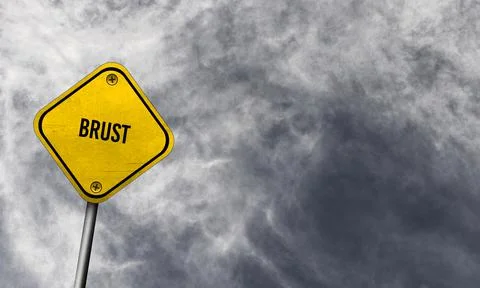 Brust - yellow sign with cloudy background Stock Photos