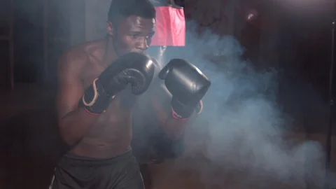 Brutal Boxer In Boxing Gloves Making Strikes With Shadow Indoor Slow Motion Stock Footage 116554501