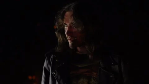 Brutal guy in a leather jacket Stock Footage 134395969