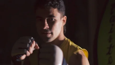 Brutal kickboxer man looking at the camera. Portrait. Slow motion Stock Footage 88714734