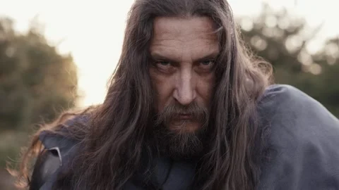 Brutal man with a beard looks at the camera Video stock 277280222
