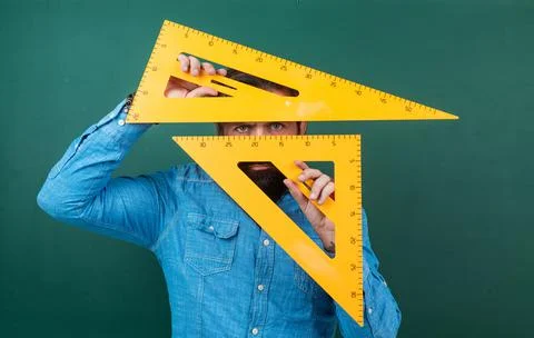 Brutal man work in classroom with blackboard. prepare for exam. college lecturer Stock Photos