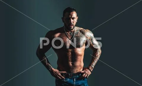 Brutal sportsman torso. steroids. sexy abs of tattoo man. male fashion. sport Stock Photos