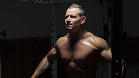Brutal strong athletic men pumping up muscles workout Video stock 72001484