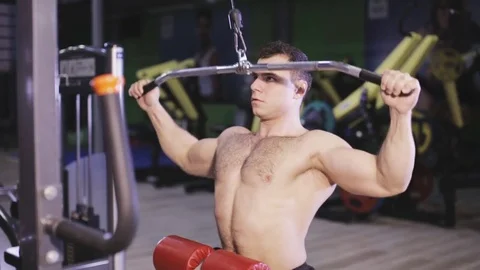 Brutal strong athletic men pumping up muscles and train in gym Stock Footage 80936711