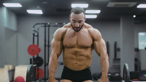 Brutal strong athletic men pumping up muscles workout bodybuilding Video stock 98458736