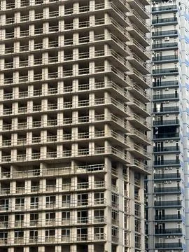 Brutalist architecture with repetitive geometric patterns in high-rise buil.. Stock Photos