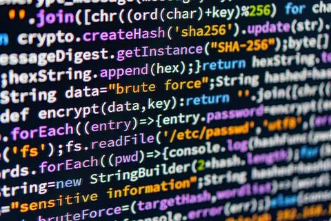 Brute force. Close-up of coded screen shallow depth of field, focusing on C.. Foto stock