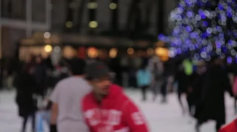 Bryant Park Ice Skating - Medium with Christmas  in BG - Various Focus Distances Stock Footage 14070820