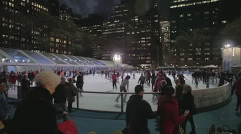 Bryant Park Ice Skating - Wide - Night (NO GRADING) Stock Footage 14072964