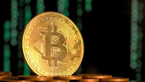 Btc bitcoin on background of binary crypto matrix Foto stock