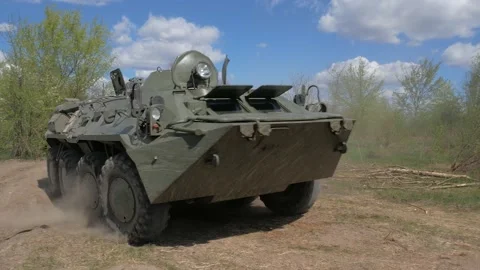 BTR-80 driving over rough terrain Stock Footage 194099878