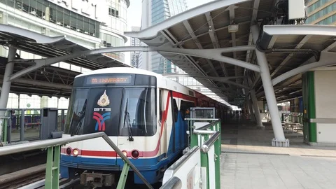 BTS sky train above traffic in Bangkok, Thailand. BTS sky train Stock Footage 128975231