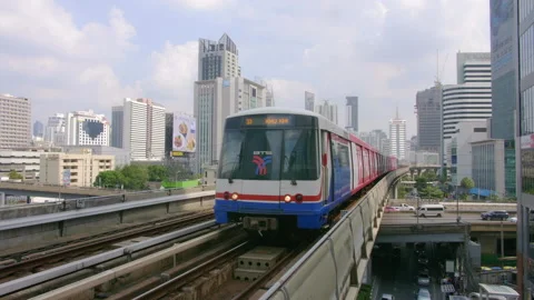 BTS sky train approaching with Bangkok city view Stock Footage 231471232