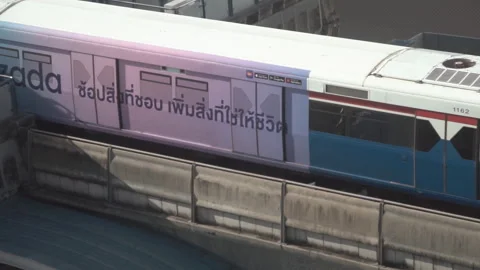 BTS sky train on rail at shopping distri... | Stock Video | Pond5